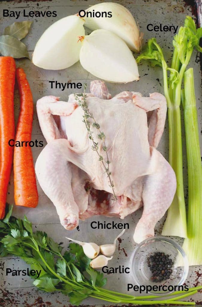 Ingredients to make chicken stock on a tray