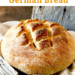 Bauernbrot - this farmer style German bread is dense, crusty and delicious. This hearty rye bread with caraway seeds is wonderful served right out of the oven with a little butter or cheese.