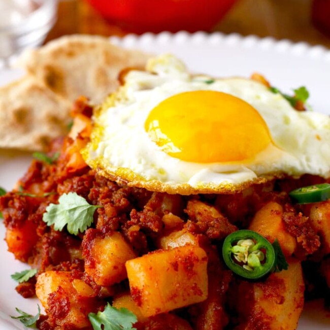 Crispy bits of chorizo, tender potatoes, and a world of flavor! This Potato and Chorizo Hash is a one-pan easy and delicious breakfast (or dinner)!
