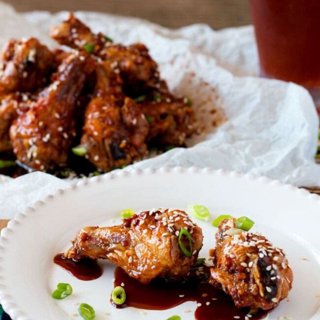 Foolproof Oven Baked Sweet and Spicy Asian Chicken Wings are extra crispy, a little sticky, deliciously sweet and a lot spicy!