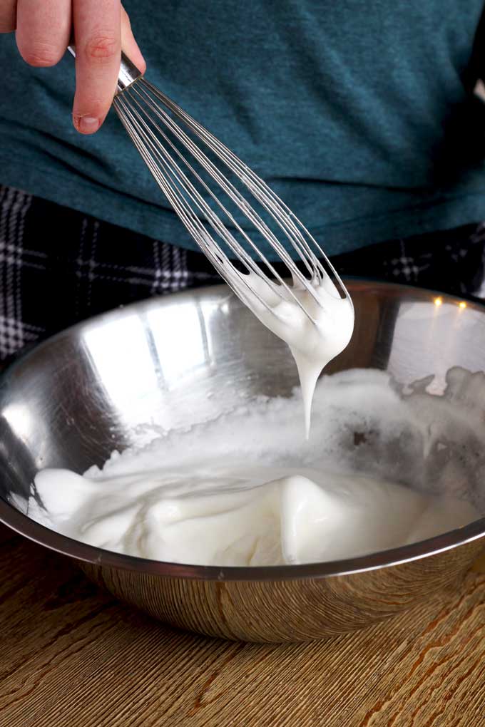 A bowl with whipped and fluffy egg whites.