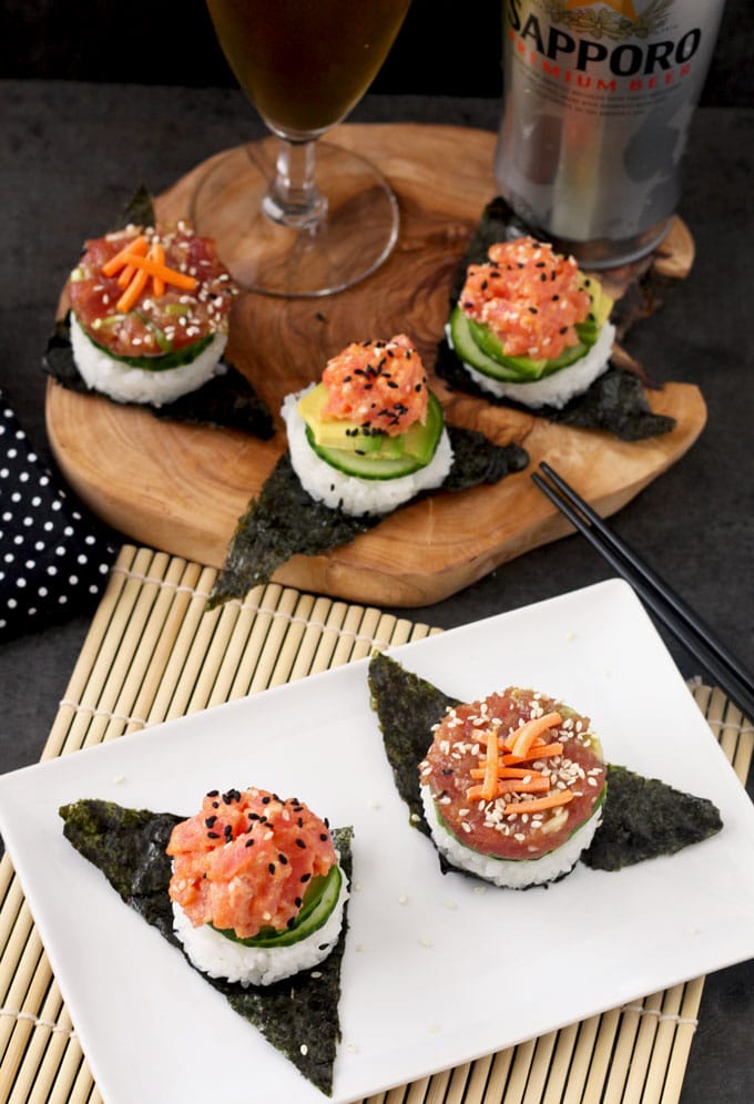 These easy to make, delicious and super flavorful sushi stacks are made with fresh tuna, sushi rice, cucumbers and avocado. Included in the recipe 2 different tuna preparations! Spicy Sriracha Tuna and Soy Sesame Lime. The perfect little bites to satisfy your sushi cravings.