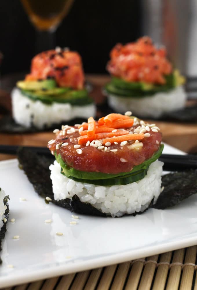 These easy to make, delicious and super flavorful sushi stacks are made with fresh tuna, sushi rice, cucumbers and avocado. Included in the recipe 2 different tuna preparations! Spicy Sriracha Tuna and Soy Sesame Lime. The perfect little bites to satisfy your sushi cravings.