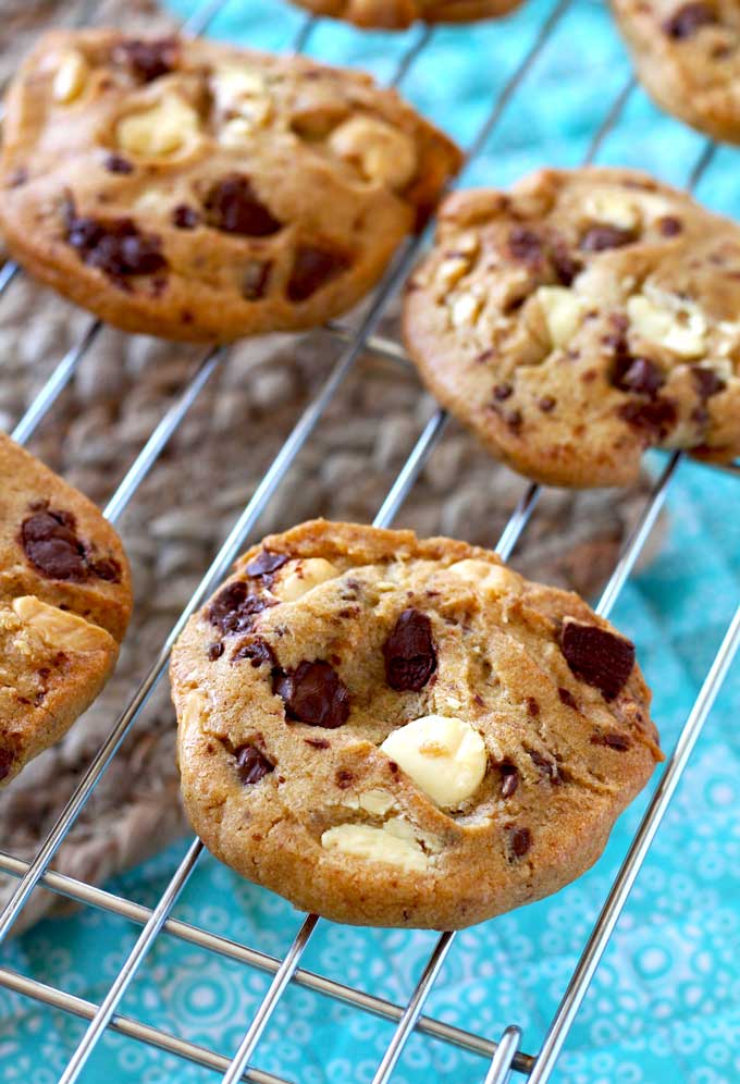 Close-up shot of White and Dark Chocolate Chunk Cookies in a cooling rack