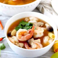 Tom Yum Soup with Shrimp in a white bowl