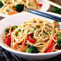 Asian noodles in a white bowl.