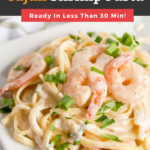 This Cajun Shrimp Pasta recipe is made with tender shrimp in a creamy and flavorful Cajun Alfredo sauce. This Shrimp Alfredo Pasta is very easy to make and ready in less than 30 minutes! #cajun #shrimp #pasta #dinner