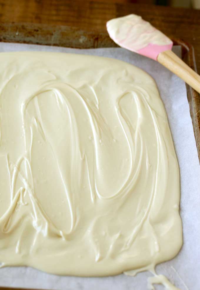 Pictured here a layer of white chocolate on a baking pan.