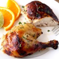 This Cuban Mojo Chicken is infused with a flavorful Mojo marinade made with citrus, garlic and spices, then oven roasted until golden brown, juicy and tender! This mouthwatering Mojo Chicken is perfect for dinner any day of the week and also fabulous for company!
