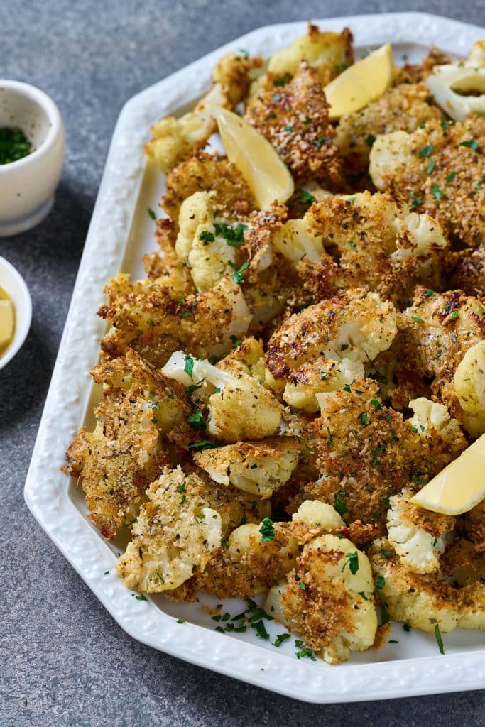 Crispy Parmesan coated cauliflower on a platter