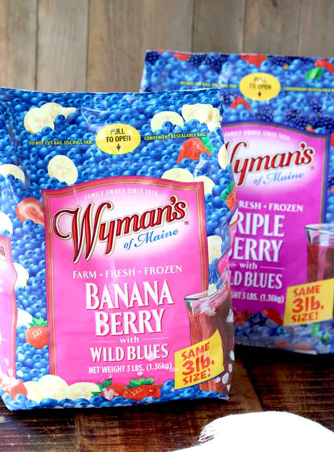 Pictured here two bags of Wyman's Frozen Fruit. Banana Berry and Triple Berry