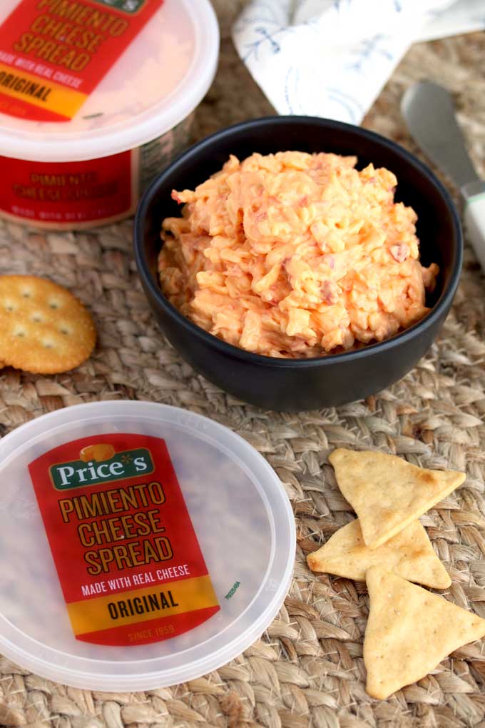 A bowl of Pimento Cheese with crackers