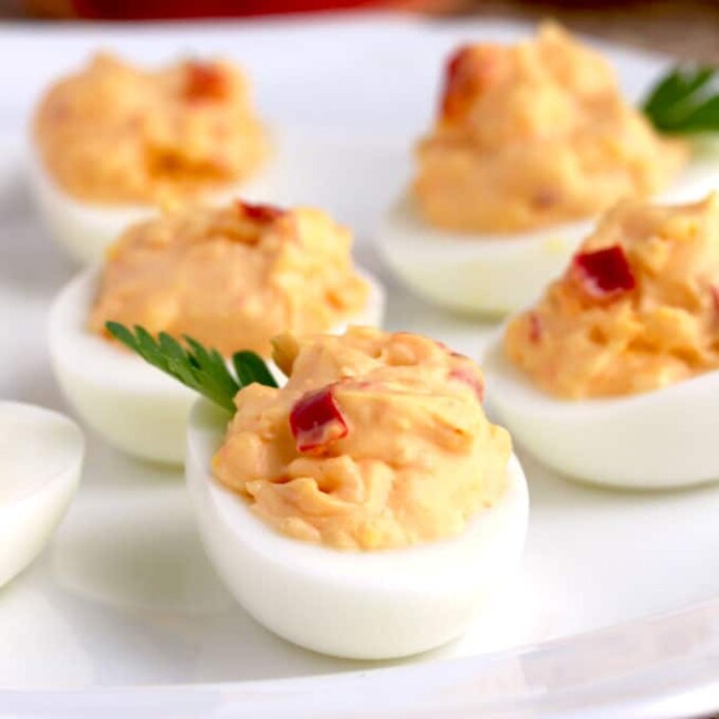 These Pimento Cheese Deviled Eggs are creamy, tasty and easy to make. A fun and delicious twist on a classic recipe and the perfect appetizer for any occasion!