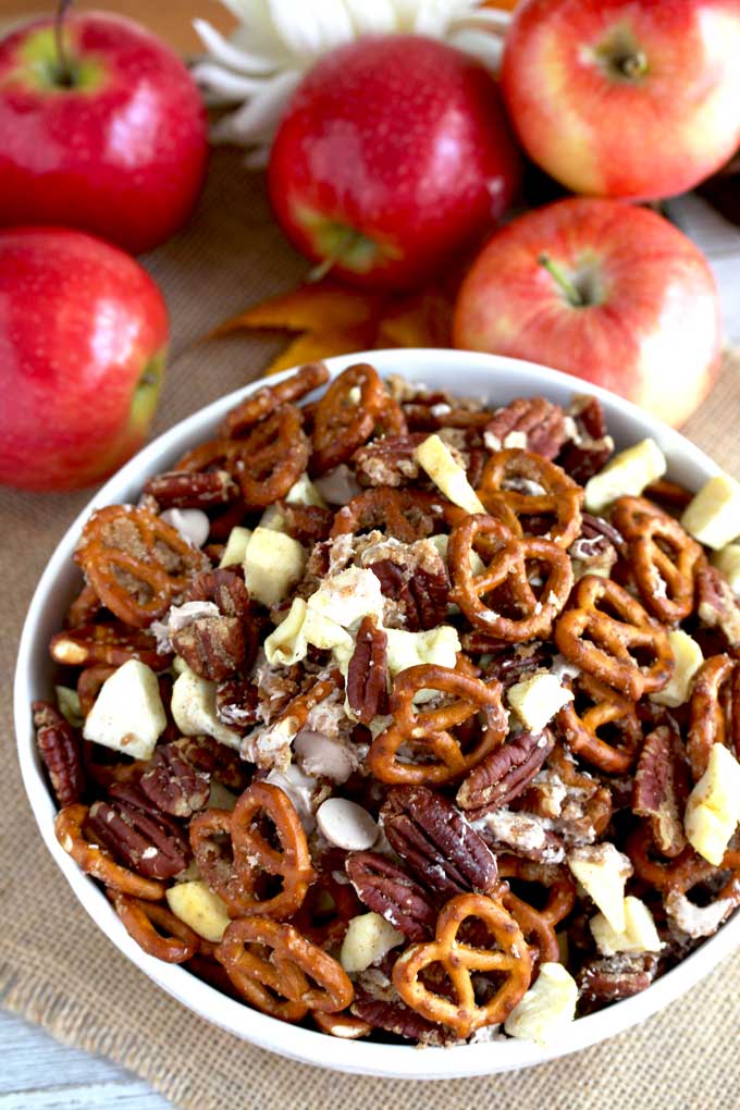 Top view of a bowl filled with caramel apple pie party mix.