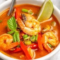 The best coconut curry soup with shrimp in a white bowl