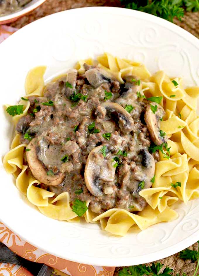 Top view of beef stroganoff topping egg noodles