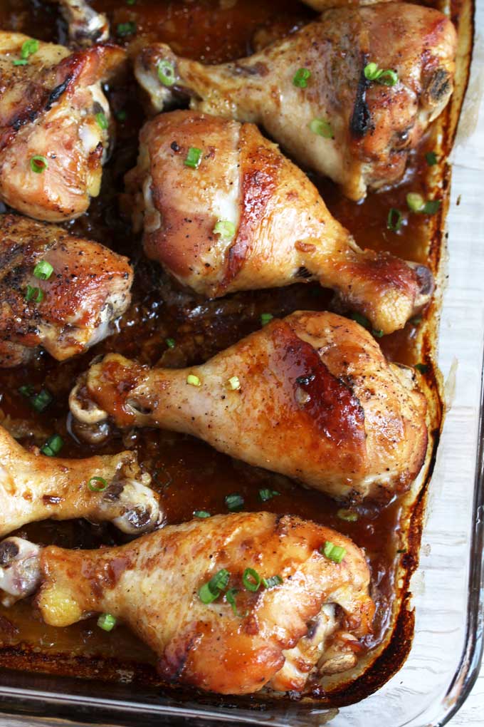 Baked Chicken Drumsticks on a baking pan.