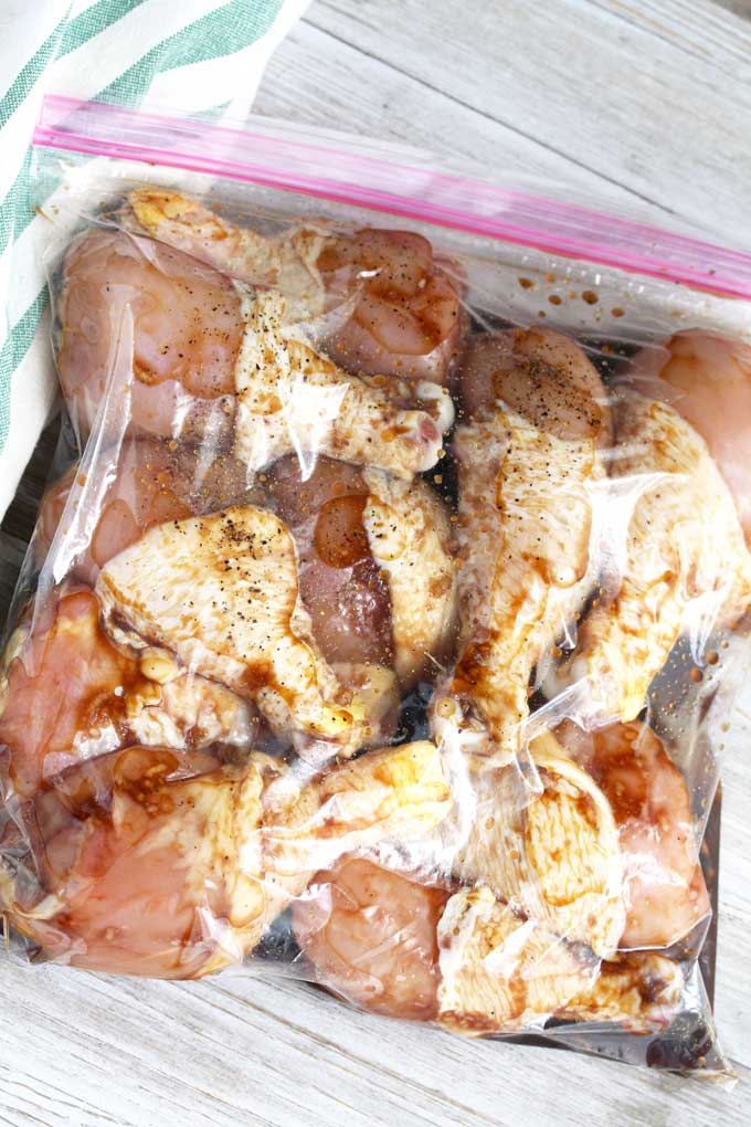 Honey Soy marinated chicken legs inside a zip top bag