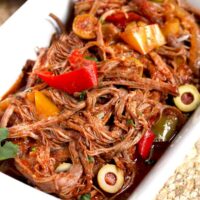 Shredded beef Cuban Ropa Vieja in a white bowl