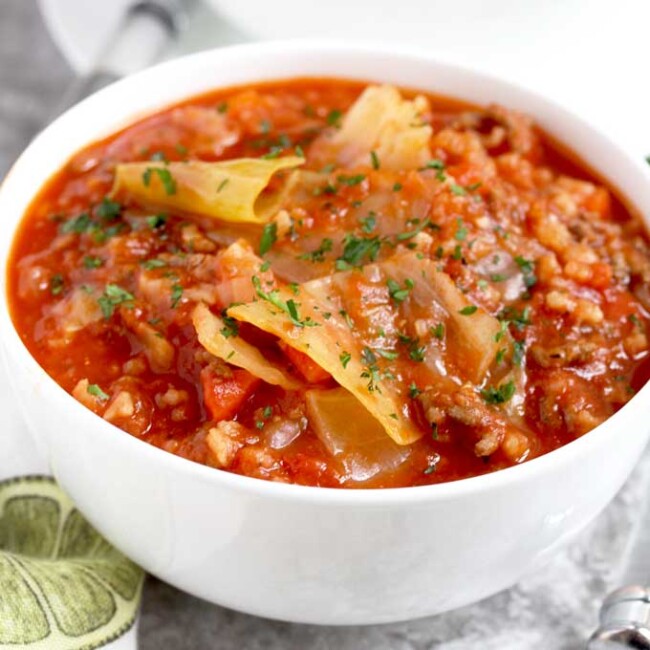 This Cabbage Roll Soup is loaded with ground beef, vegetables and rice in a savory tomato broth. Enjoy the flavors of Stuffed Cabbage Rolls without all the work!