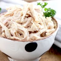 Instant Pot Chicken breast shredded served in a bowl.