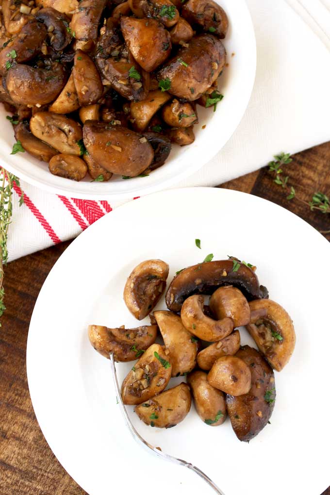 Sauteed mushrooms served on a plate.