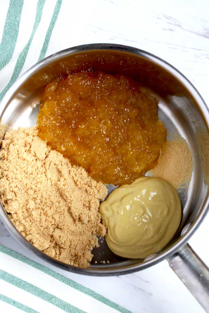 Ingredients to make the brown sugar glaze inside a pot