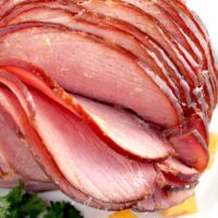 This Slow Cooker Ham is tender, juicy, tasty and perfect for the Holidays! This easy Crock Pot Ham requires minimal prep, a few ingredients and saves you oven space!