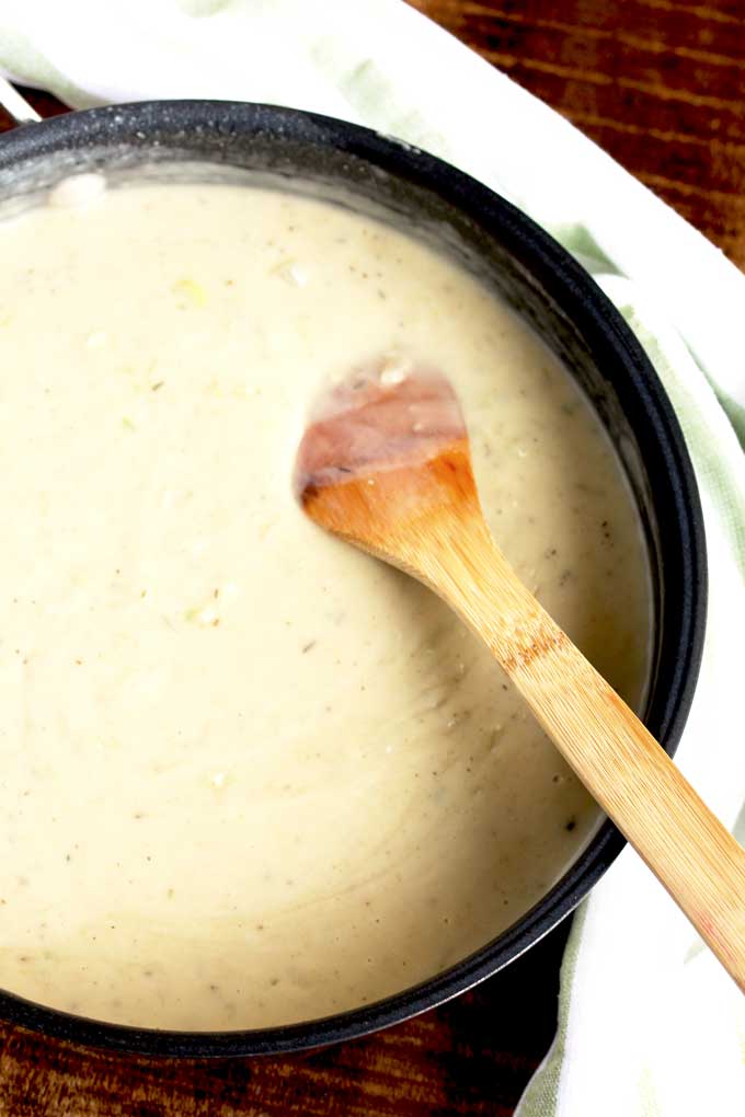 Creamy sauce base in a pan.