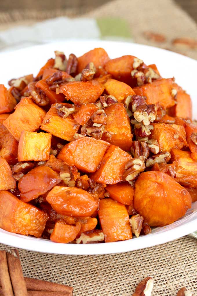 Candied Sweet Potatoes served in a white bowl.