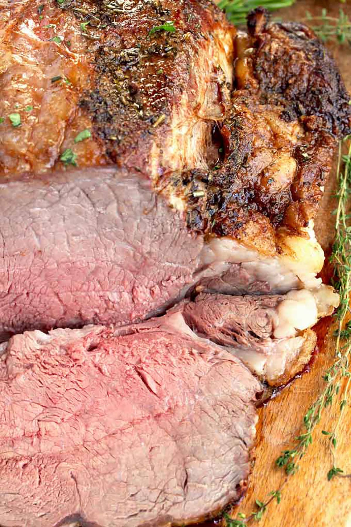 Close up of side of sliced prime rib roast.