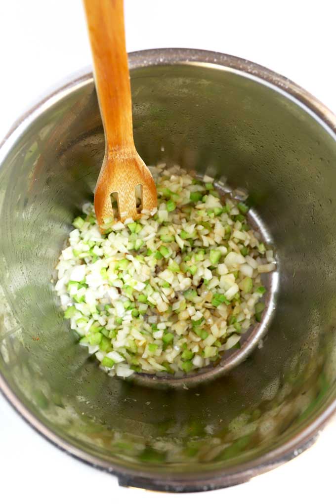Chopped onions and celery sauteing in the instant pot.