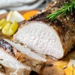 This Pork Loin Roast is coated with a mixture of honey mustard, balsamic vinegar, garlic and fresh rosemary then baked over vegetables until perfectly tender and juicy.  This pork loin recipe is easy to make yet impressive enough to serve during the holidays