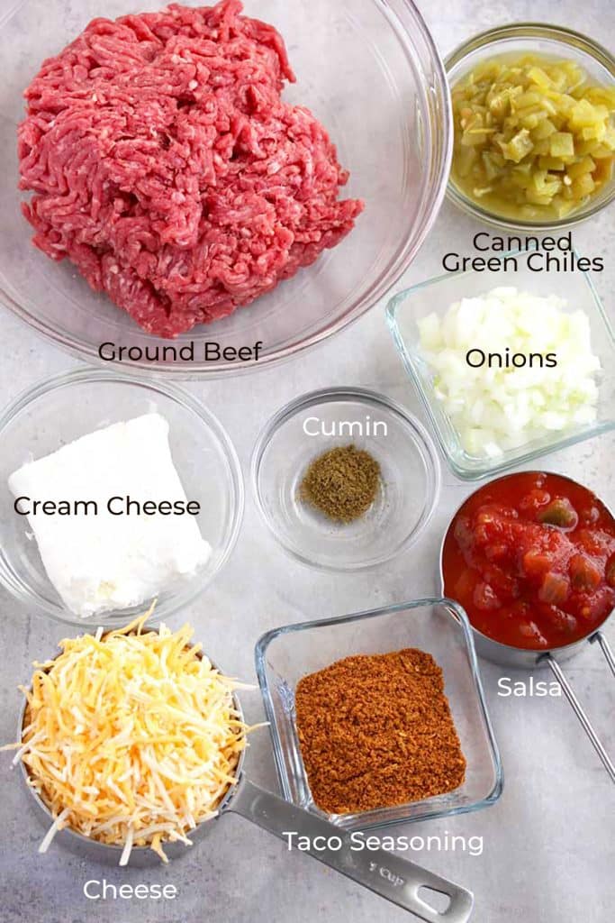 Taco Dip Ingredients on  a white surface