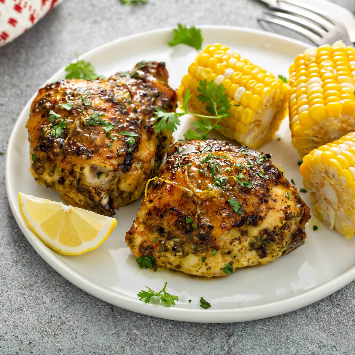 Lemon Herb Oven Roasted Chicken Thighs - Lemon Blossoms