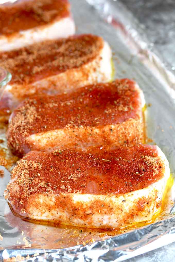 Pork Chops seasoned on both sides with dried rub