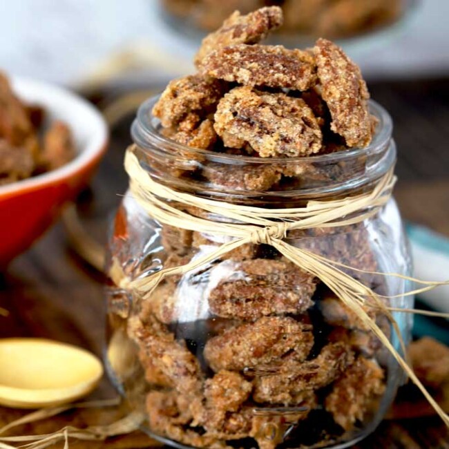 Candied Pecans in a glass jar.