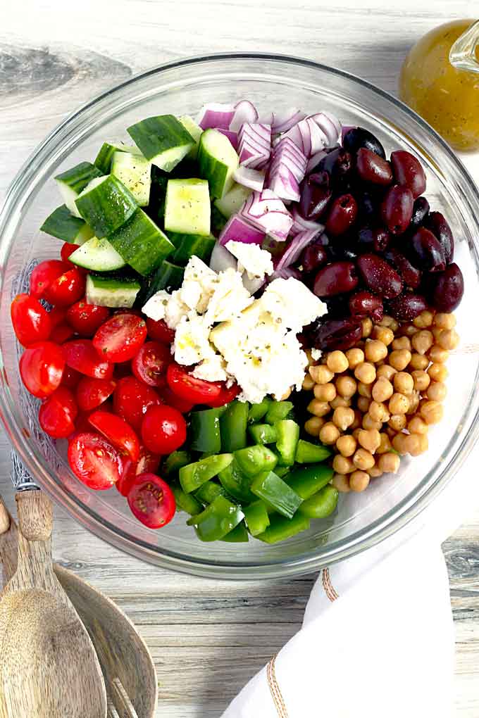 All the ingredients to make this healthy salad in a glass bowl