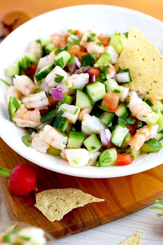 big bowl of Mexican ceviche with tortilla chips.