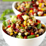 Pin image of a bowl filled with Mexican Three Bean Salad