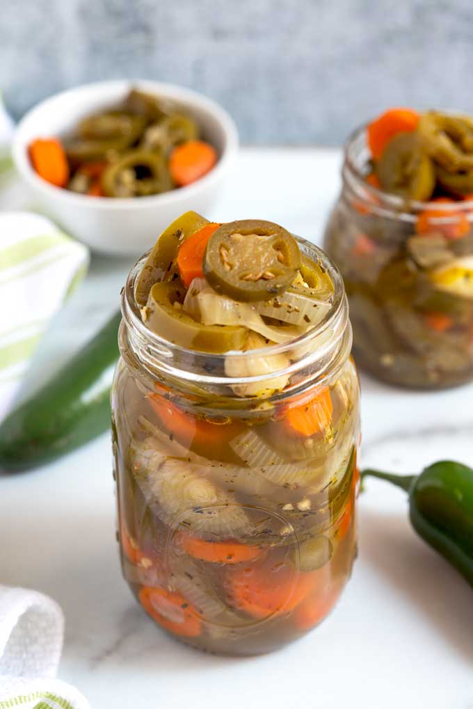 A jar of pickled jalapenos
