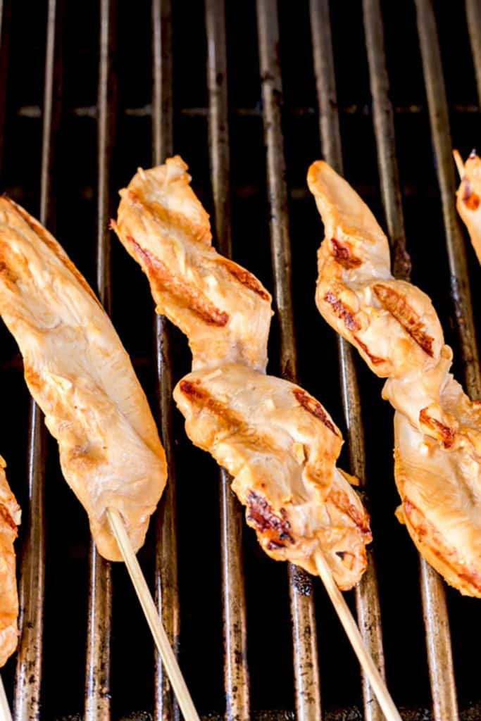 Chicken Skewers on a grill.
