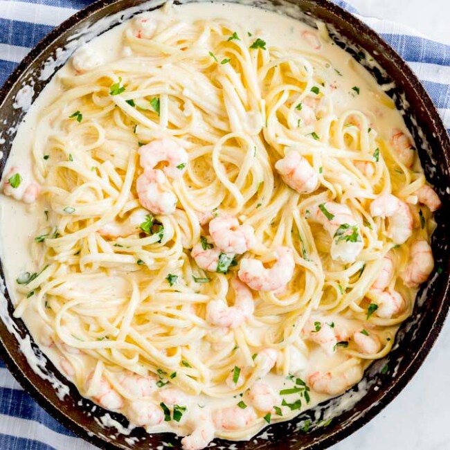 Parmesan pasta with shrimp in a skillet