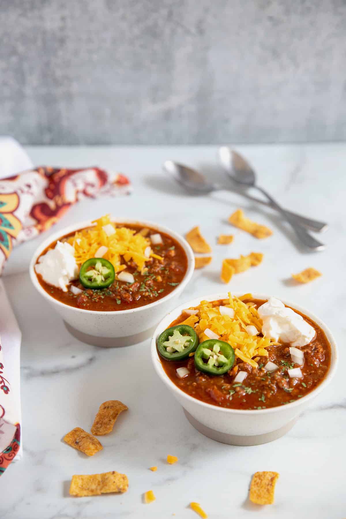 Homemade chili served on white bowls