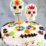 Dia De Los Muertos Cake on a cake platter