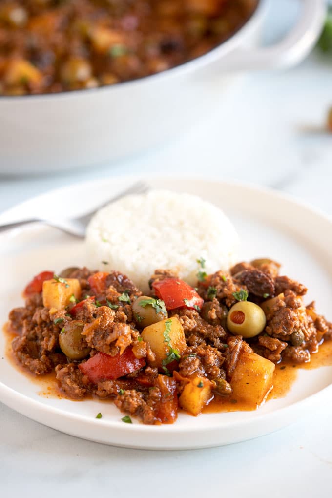 A plate of Cuban picadillo served with white rice