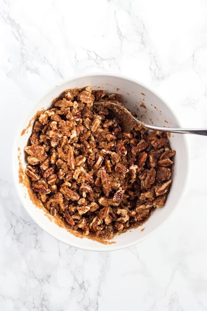 pecan topping in a small white bowl