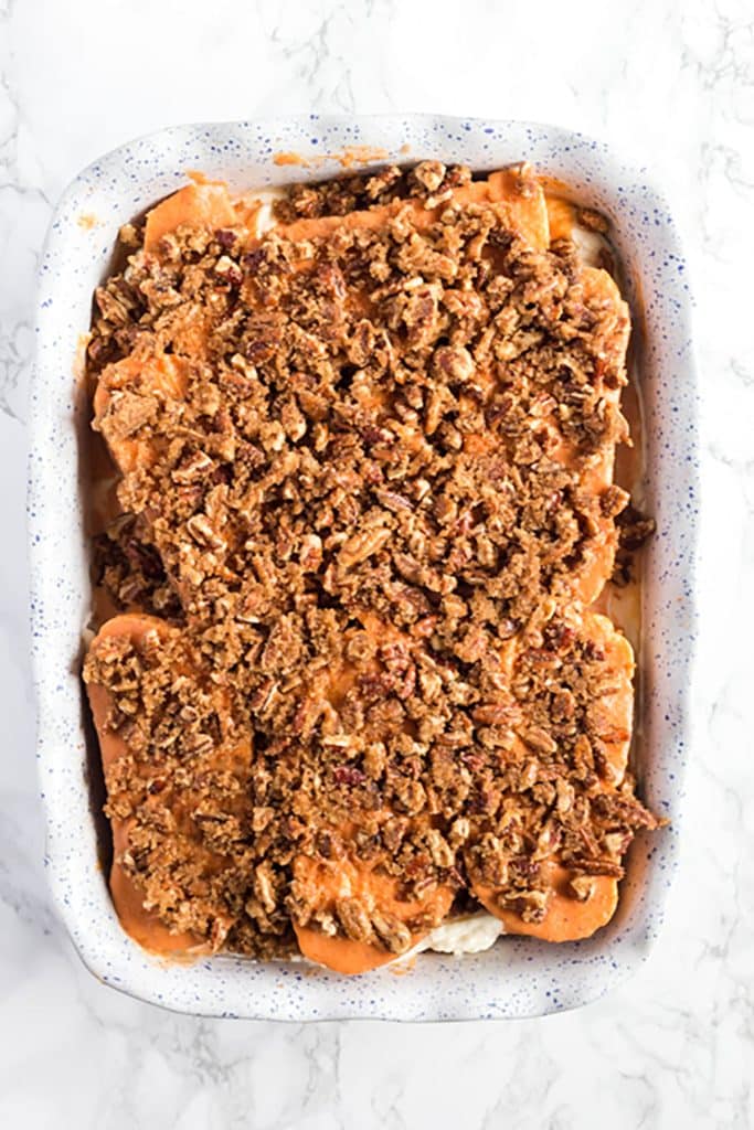 stuffed pumpkin french toast with brown sugar pecan topping ready to bake