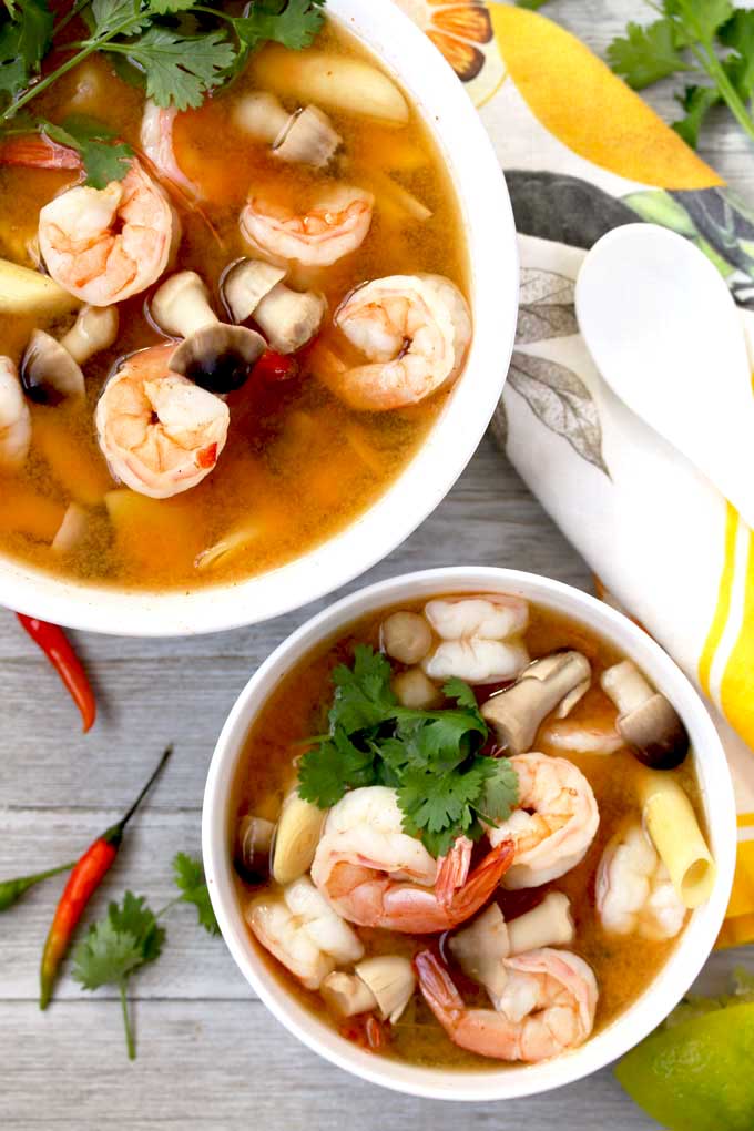 Top view of bowls with Thai Hot and Sour Soup