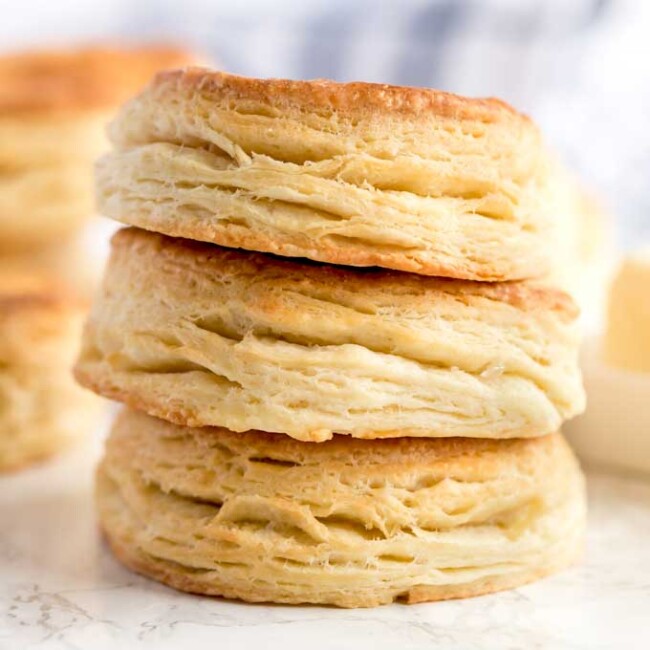 Biscuits stack on a white marble counter
